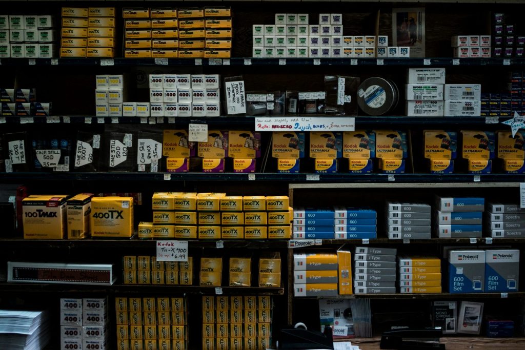 assorted-labeled pack lot in shelf